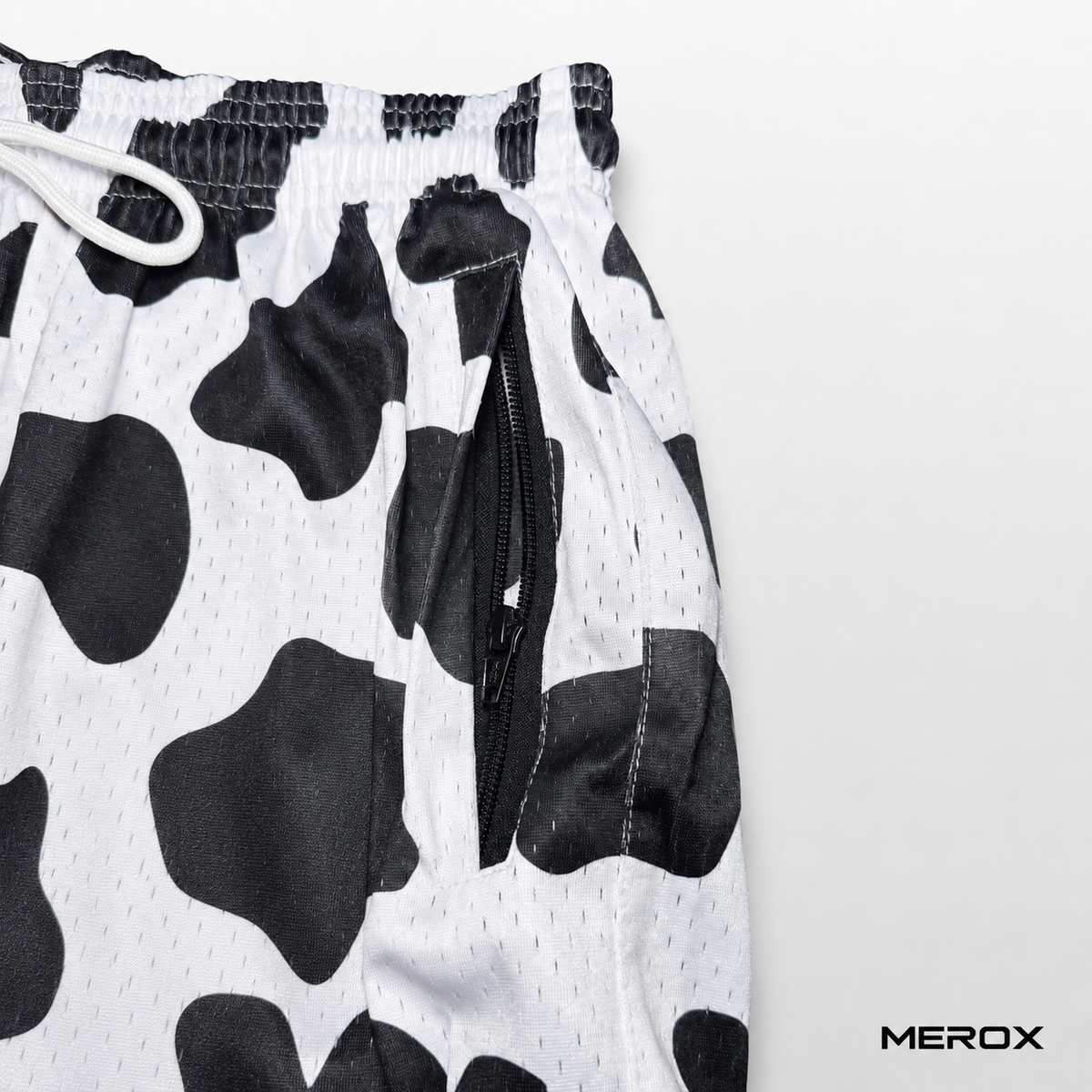 MEROX Black and White Cow Print mesh shorts zipper pocket detail