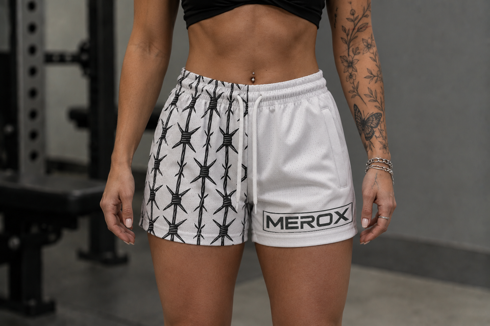 Approved female model wearing MEROX White Half Barbed Wire mesh shorts