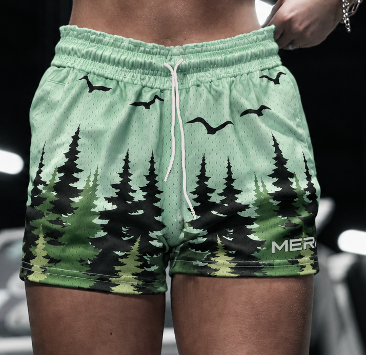 Woman wearing MEROX Pine Trees shorts