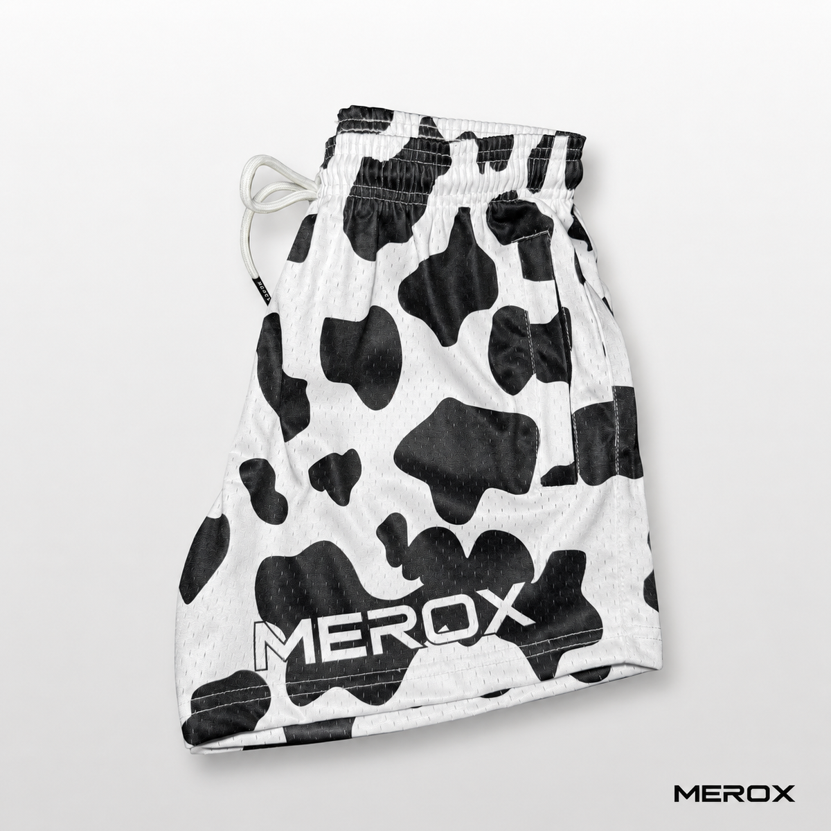 MEROX Black and White Cow Print 5-inch mesh shorts side view