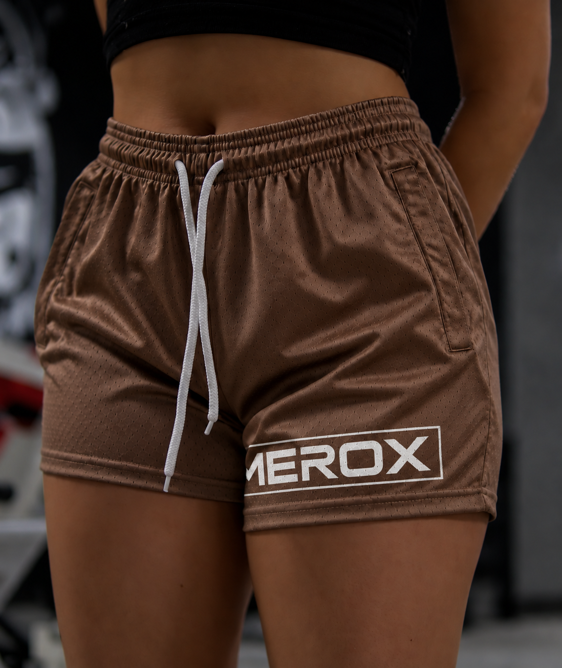 MEROX Brown 5-inch mesh shorts on female model