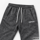 White MEROX embroidery and drawstring waistband detail on black acid wash joggers
