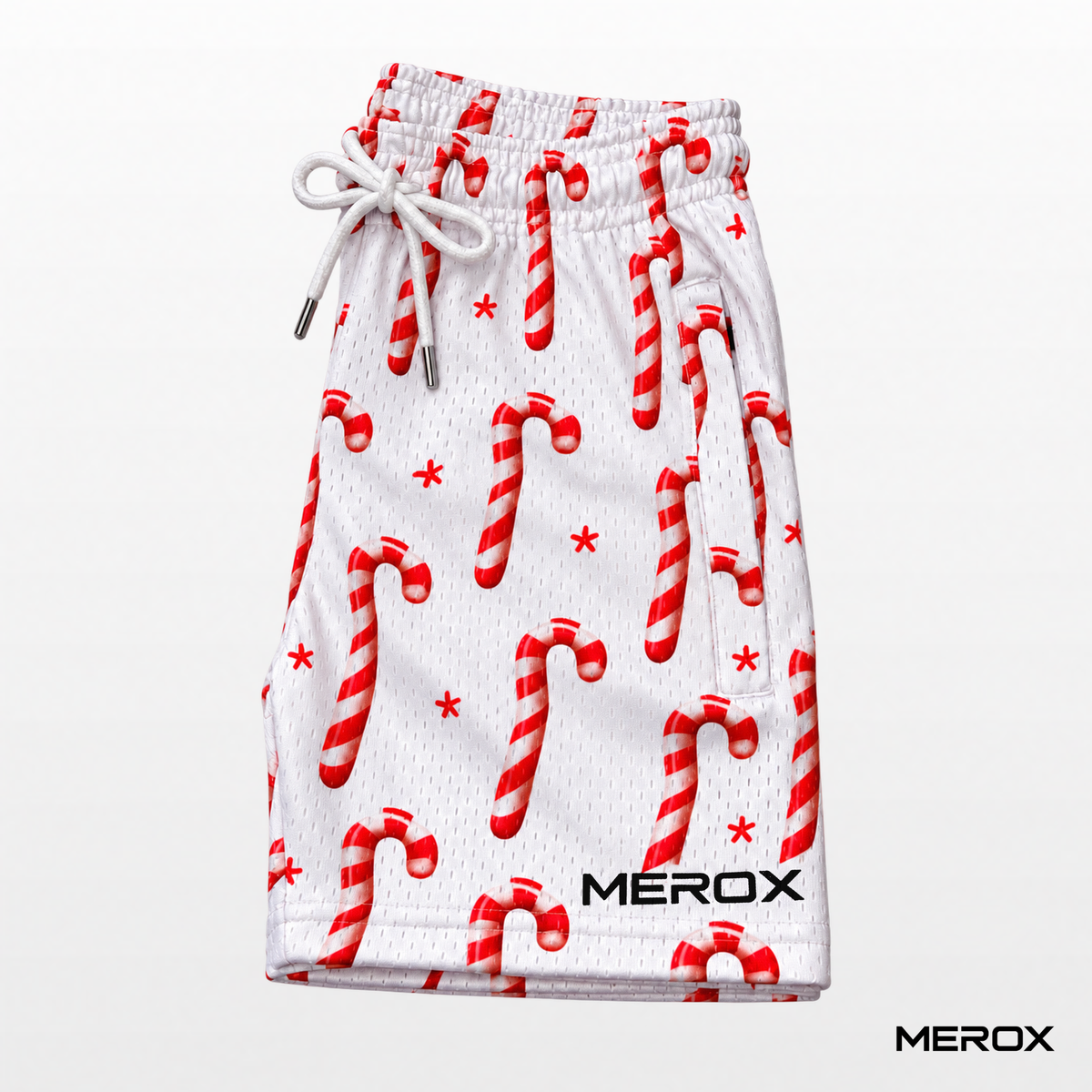 MEROX Candy Cane mesh shorts, side view with drawstring waist and MEROX logo