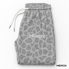 Folded MEROX cheetah joggers showing pattern, drawstrings and embroidered logo