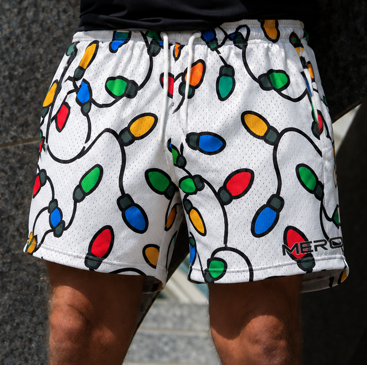 Man wearing MEROX Christmas Lights shorts