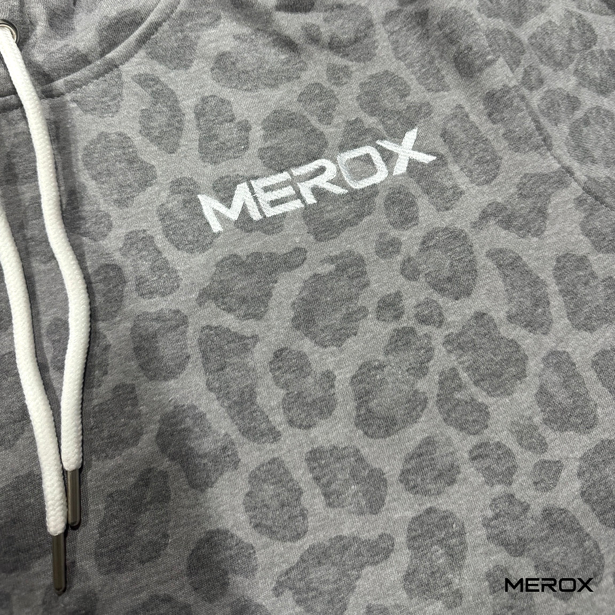 MEROX cheetah hoodie embroidery and fabric detail