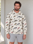 Miles wearing the cream MEROX Fishing Lure hoodie