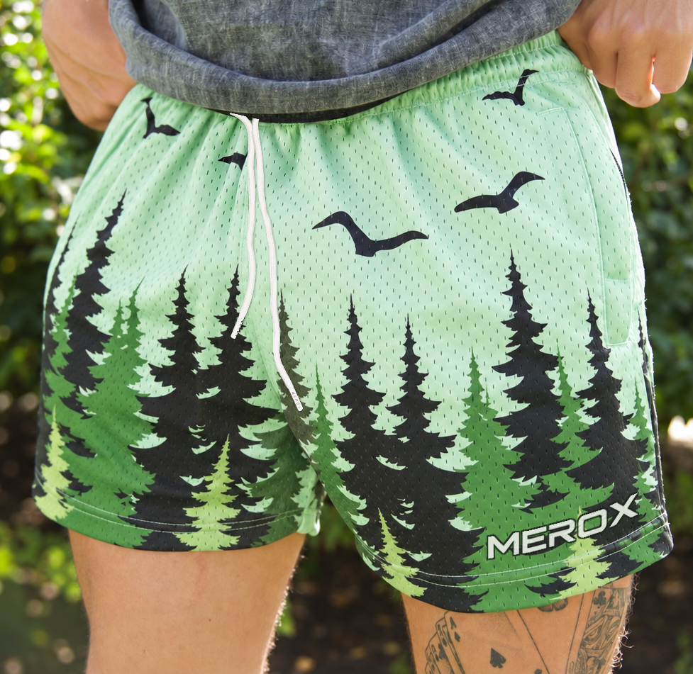 Man wearing MEROX Pine Trees shorts