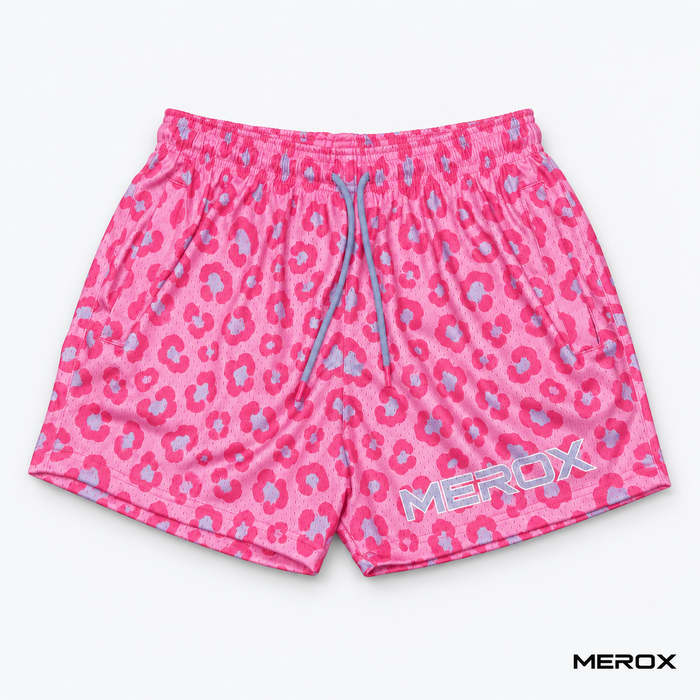 Zipper pocket detail on MEROX pink and blue leopard mesh shorts