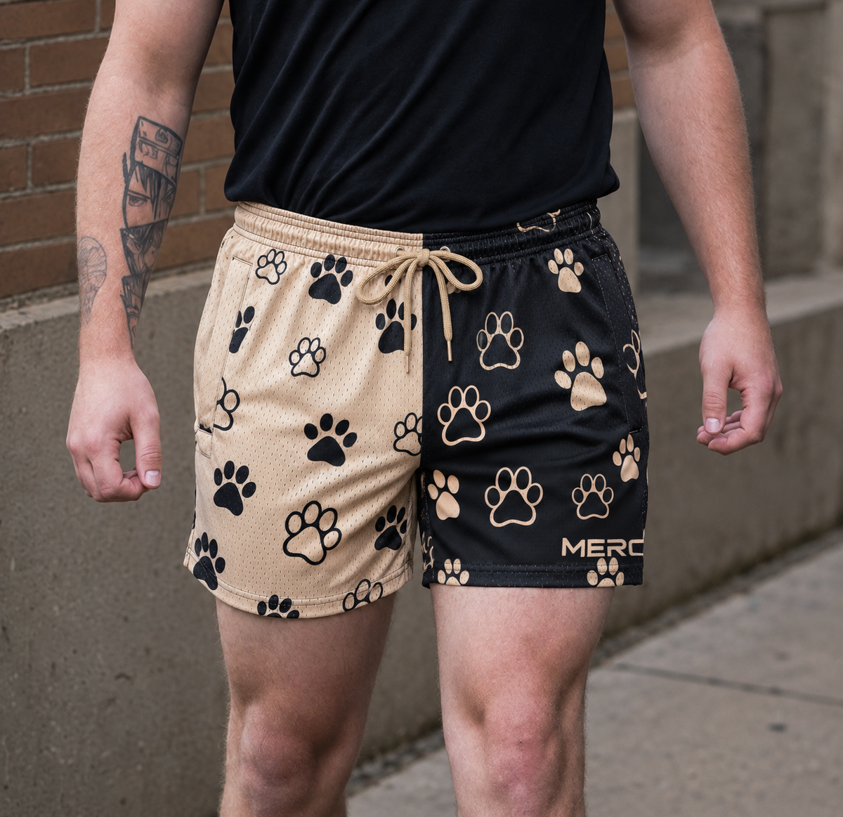 Man wearing MEROX Split Paw Print 5-inch mesh shorts, approved corrected paw pattern