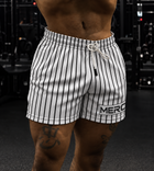 Man wearing MEROX White Pinstripe 5-inch mesh shorts